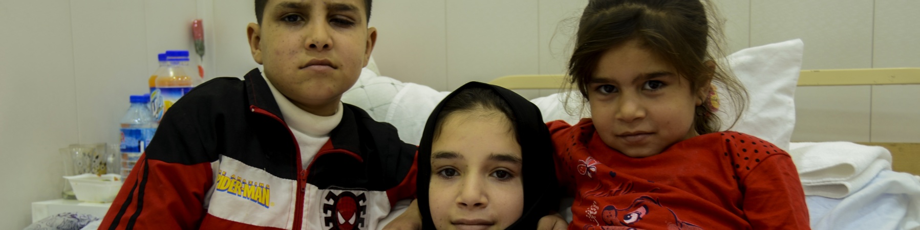 I tre figli di Abid sopravvisuti all'esplosione in Iraq