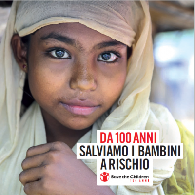 copertina dossier 100 anni di Save the Children con bambina velata in primo piano